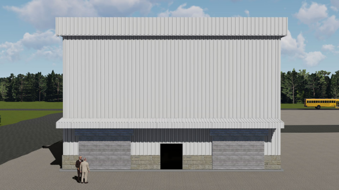Front elevation of white industrial warehouse with dual rolling shutters and stone masonry plinth by ShreeSES - detailed peb design
