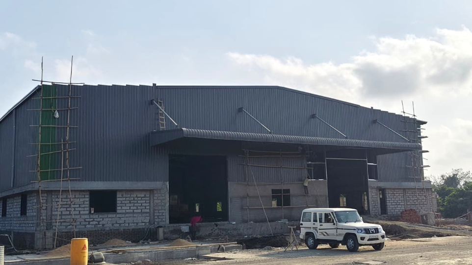 Customized pre-engineered factory shed interior, designed with lightweight high-strength steel to ensure cost efficiency without compromising structural integrity - detailed peb design shreeses